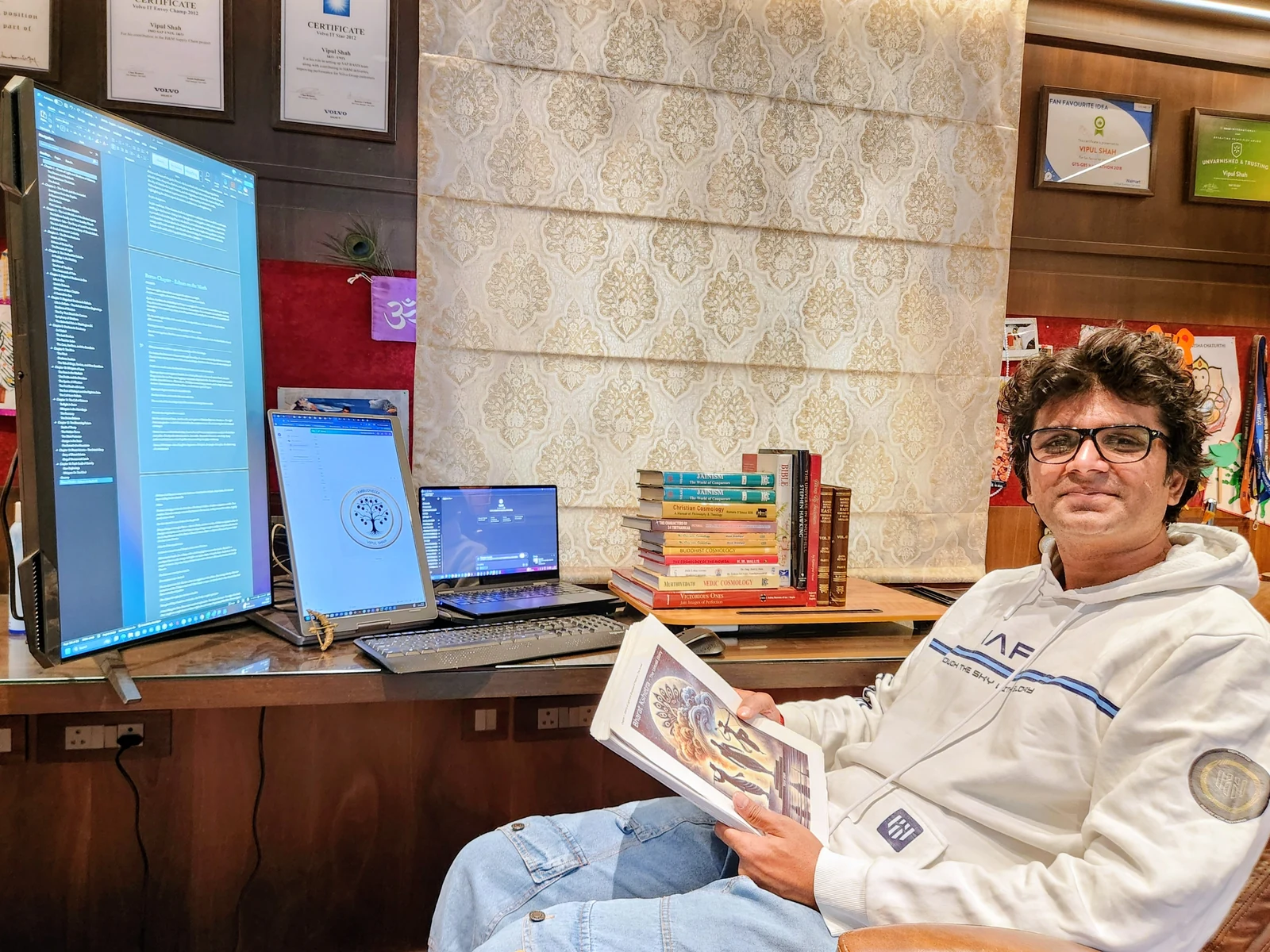 Vipul Shah working at his desk