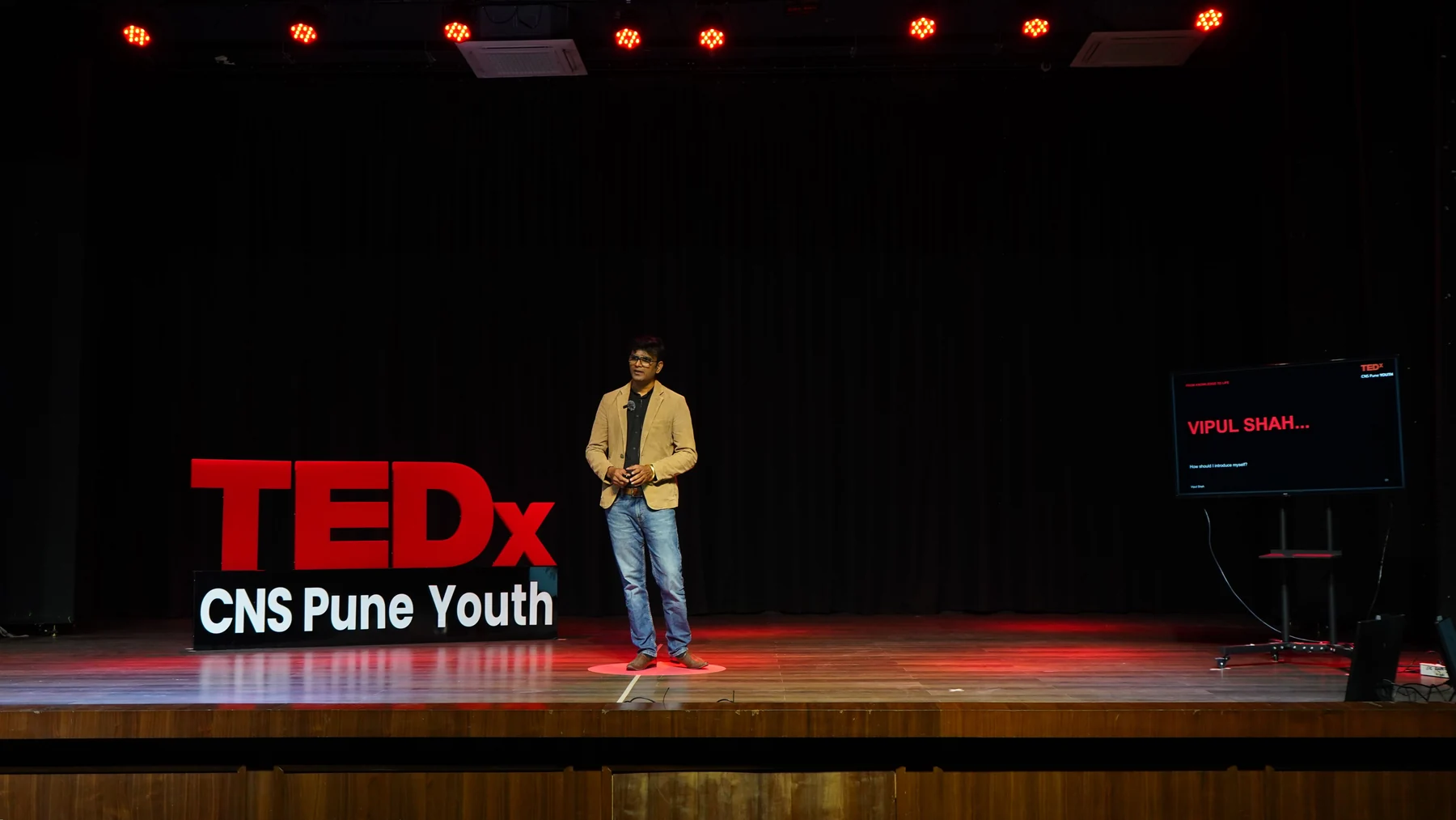 Vipul Shah on the full TEDxCNS Pune Youth stage